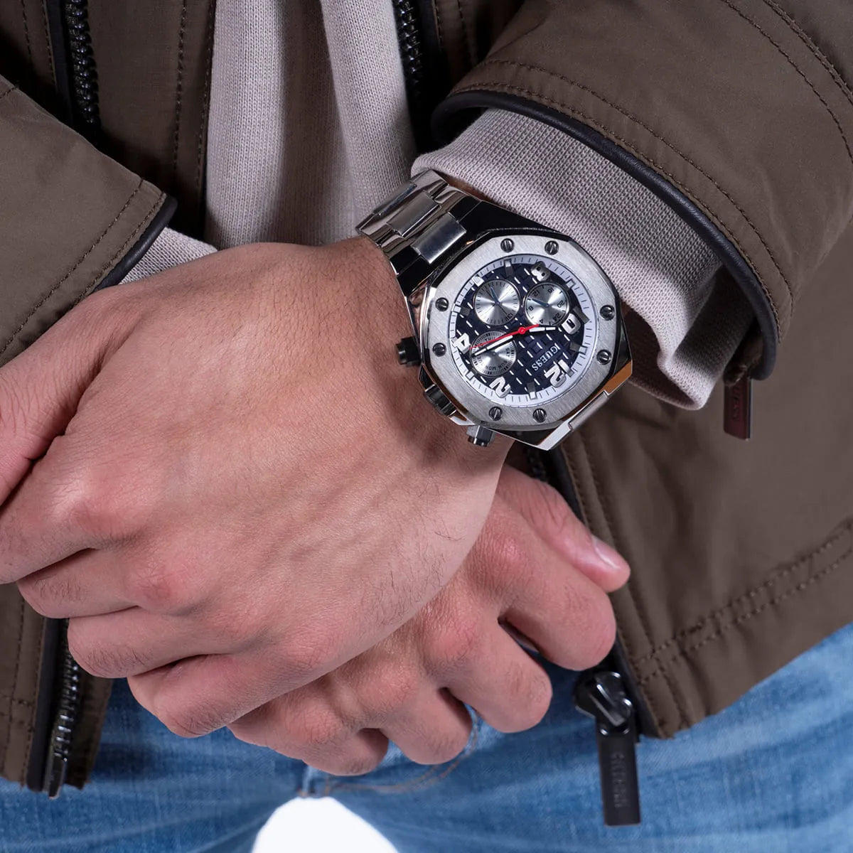 Guess Legacy Chronograph on wrist with sleeve showing watch in everyday wear