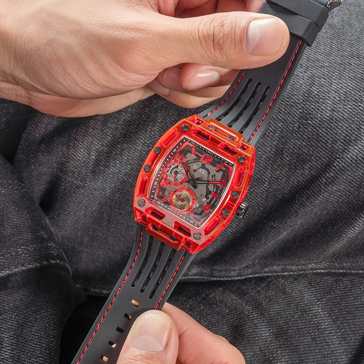 GUESS GW0499G4 watch close-up showing rubber strap adjustment