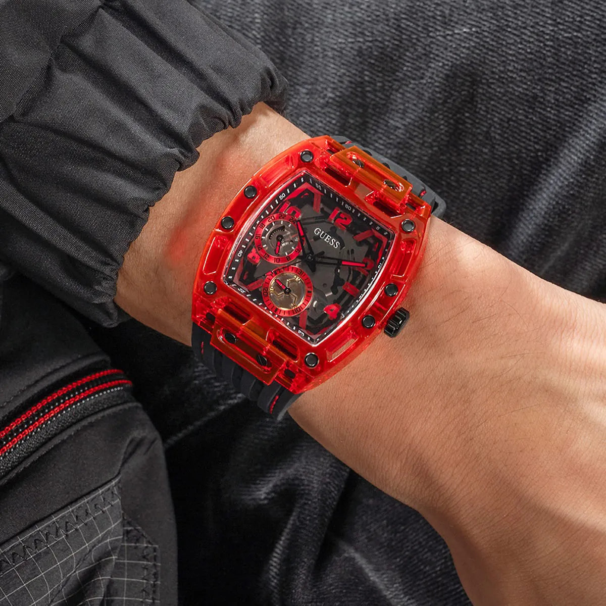 GUESS GW0499G4 red square watch on-wrist side view with multi-function dial
