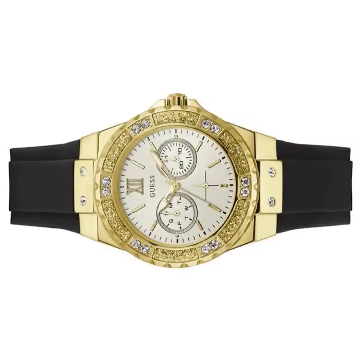 Guess Limelight Crystals women's watch worn on wrist with gold case and black rubber strap