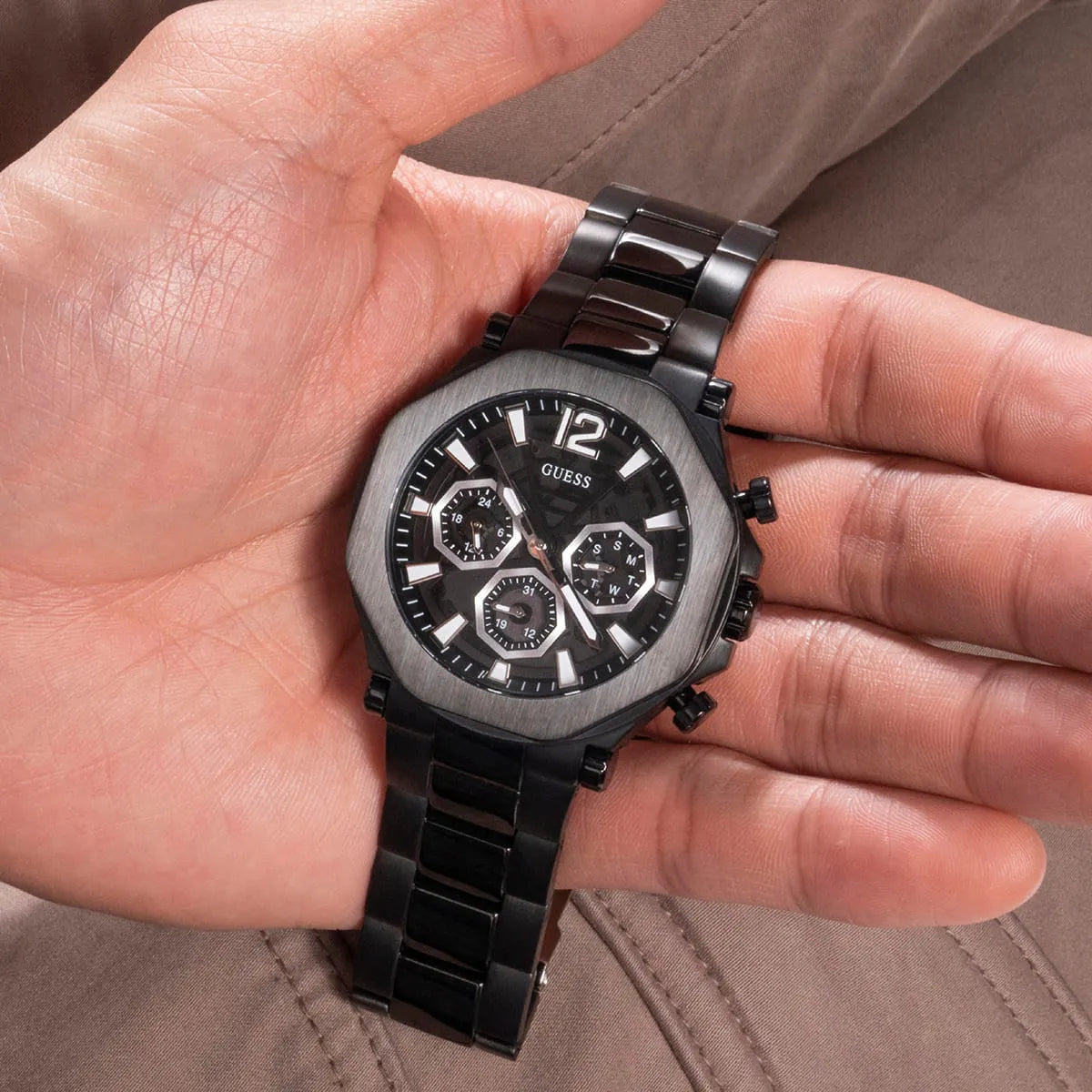 Guess GW0539G3 black chronograph watch worn on wrist showing dial and bracelet