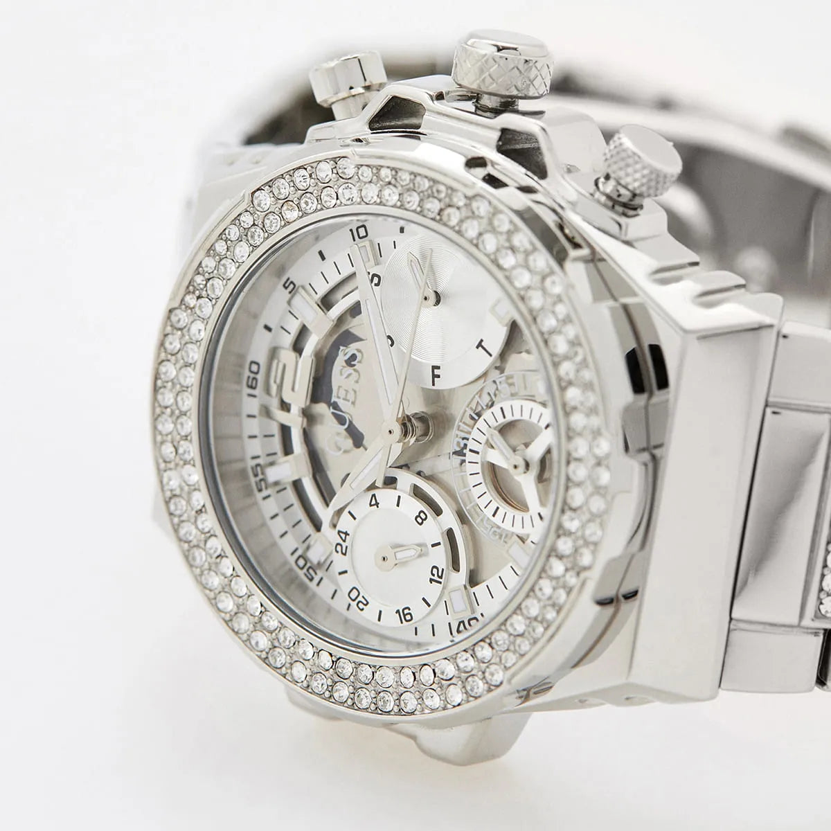 Close-up of Guess GW0552L1 watch dial with chronograph subdials, crystal bezel, and silver tone