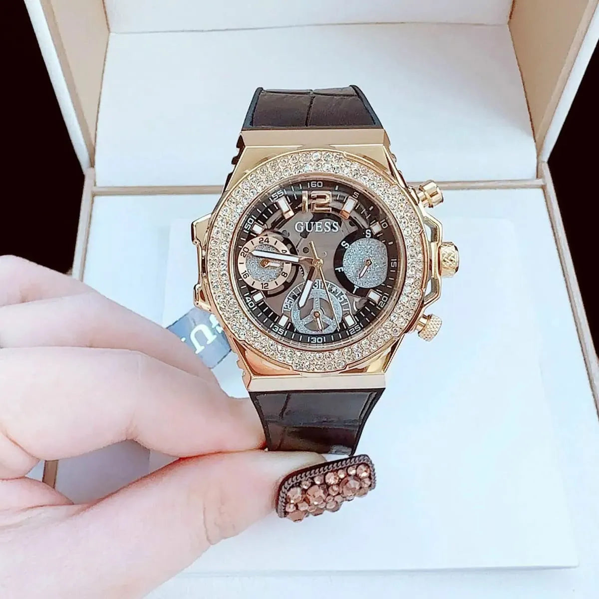 Guess GW0553L4 gold chronograph watch in white presentation box with crystal charm