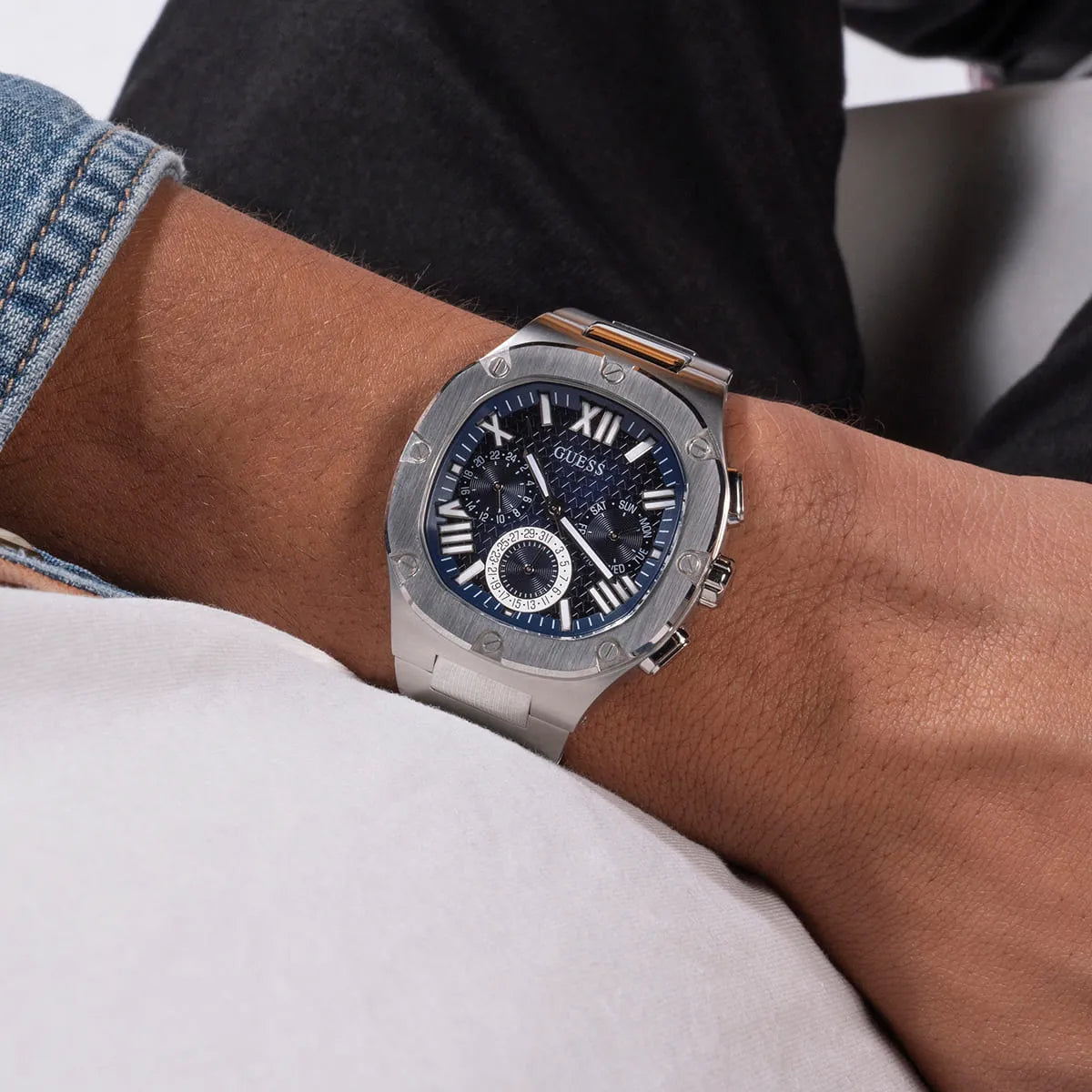 Guess Headliner watch on wrist displaying multifunction chronograph dial