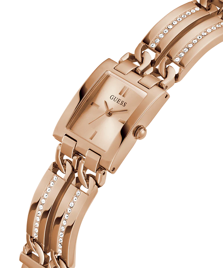 GUESS rose gold analog ladies watch worn on wrist displaying crystal-detailed strap