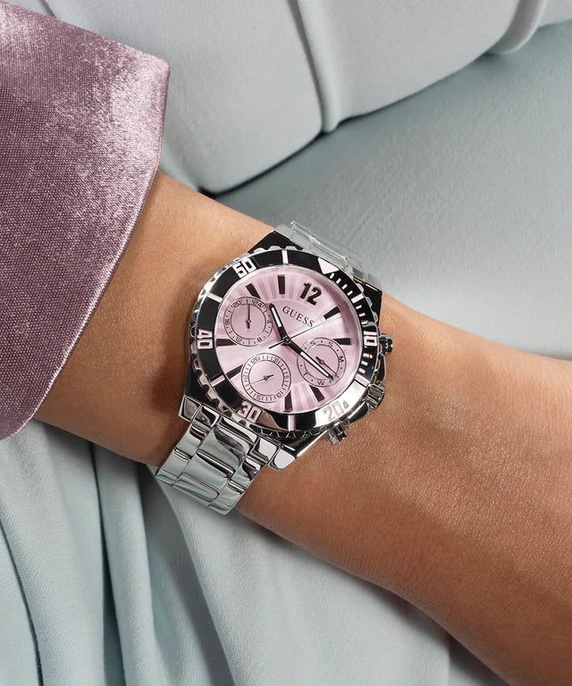GUESS GW0696L1 chronograph watch on wrist displaying pink dial with three subdials