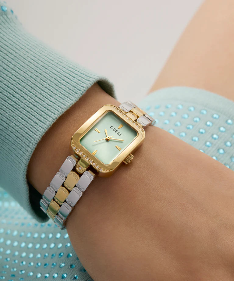 GUESS GW0865L4 2-tone ladies watch worn on wrist with mint dial visible