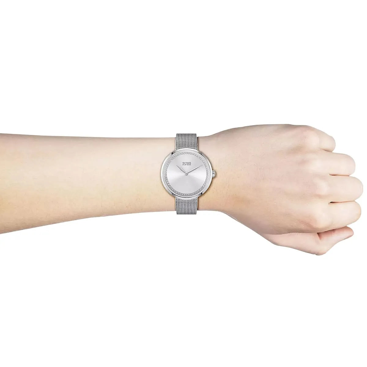 Hugo Boss women's watch on wrist showing silver dial and stainless steel mesh bracelet