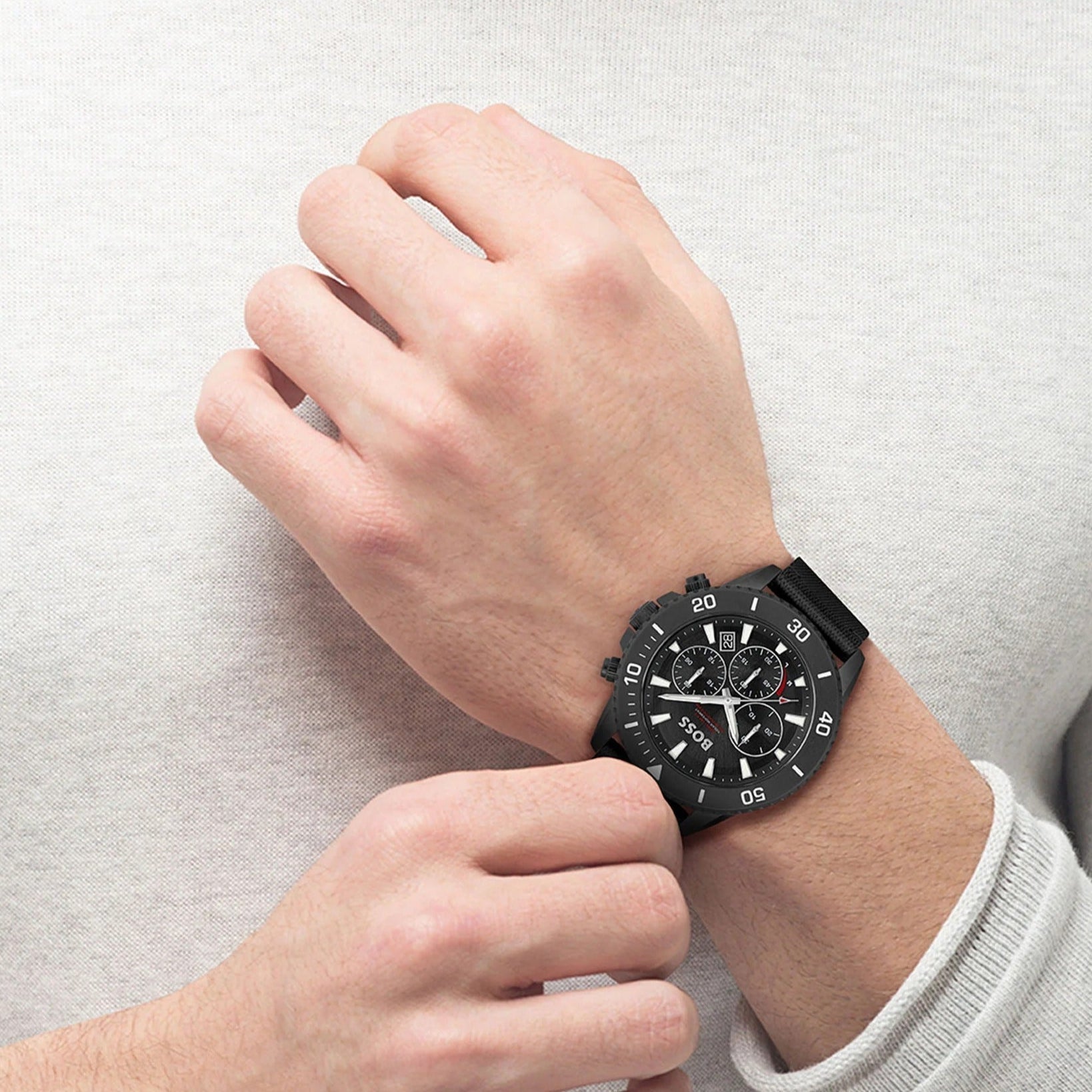 Hugo Boss Admiral black chronograph watch worn on male wrist
