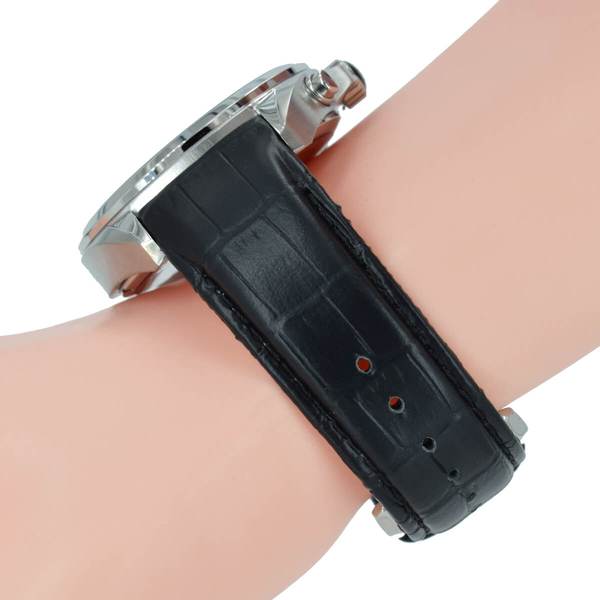 Hugo Boss chronograph watch with black leather strap worn on wrist
