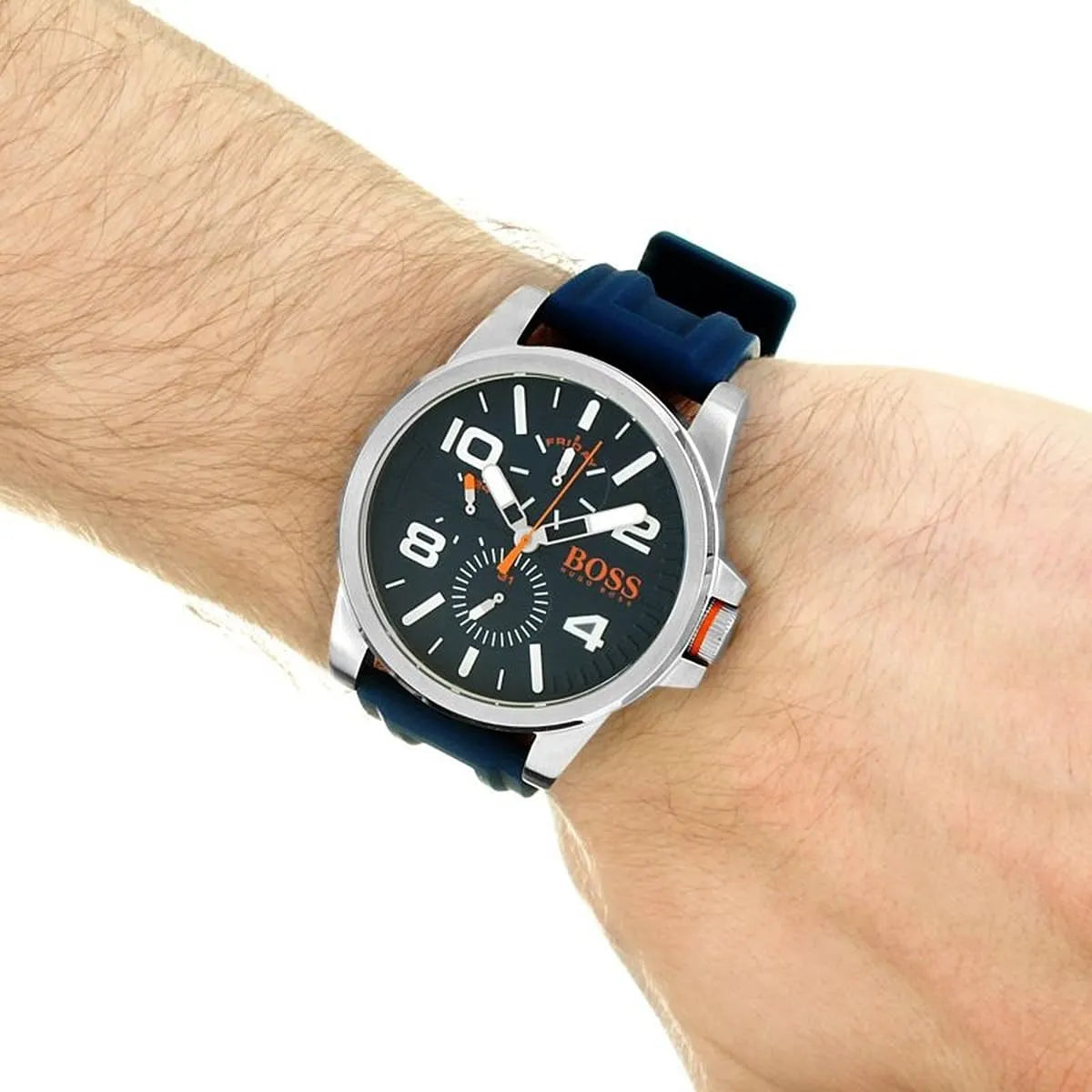 Hugo Boss Detroit watch worn on wrist with blue silicone strap and white dial