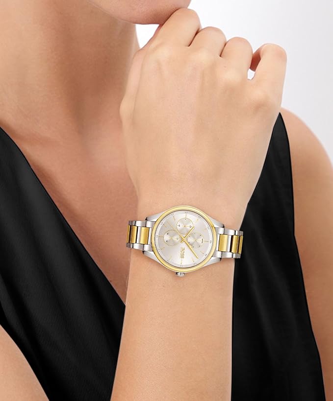 Hugo Boss Grand Course 36mm women's watch worn on wrist with silver dial and two-tone bracelet