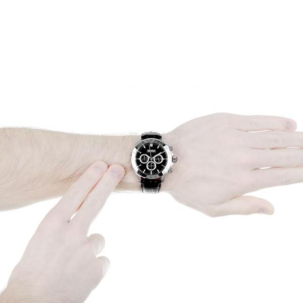 Hugo Boss Ikon chronograph watch worn on wrist with black dial and leather strap