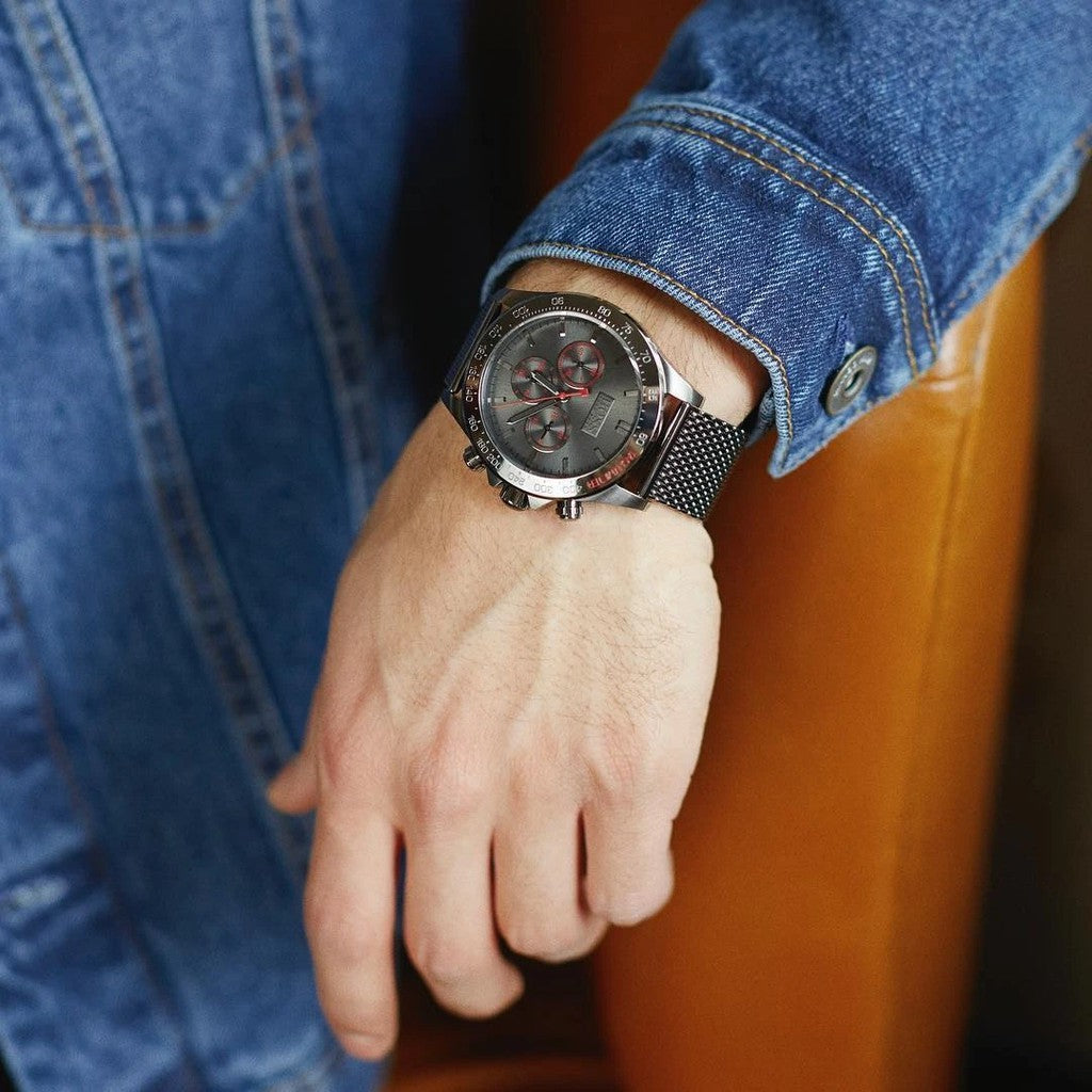 Hugo Boss Ikon chronograph watch worn on wrist with grey dial and mesh strap