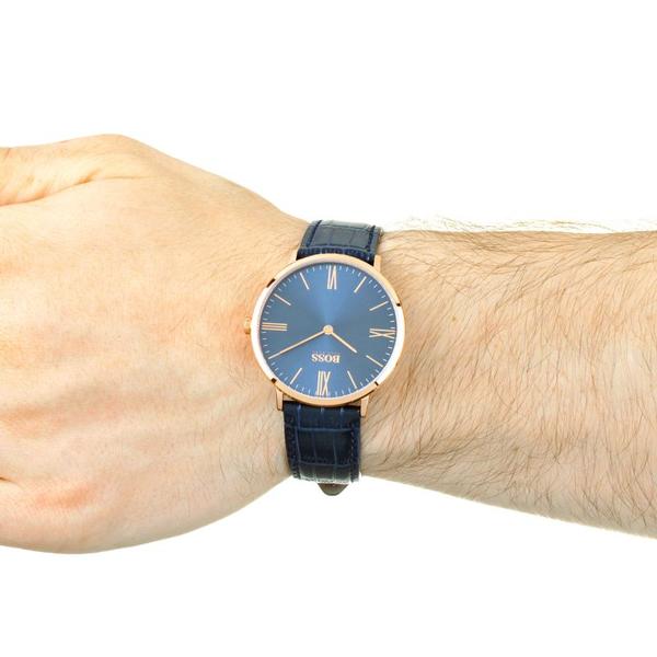 Hugo Boss Jackson watch worn on wrist with blue dial and navy leather strap
