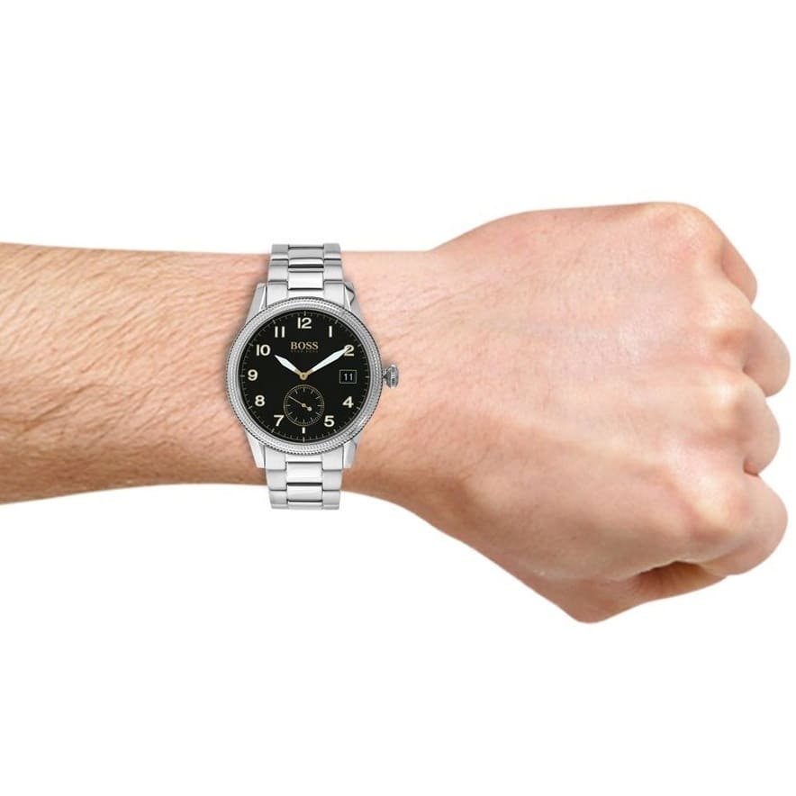 Hugo Boss Legacy watch worn on wrist showing black dial and silver bracelet