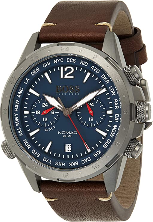 Hugo Boss Nomad chronograph watch at angle showing blue dial, world time bezel, brown leather strap