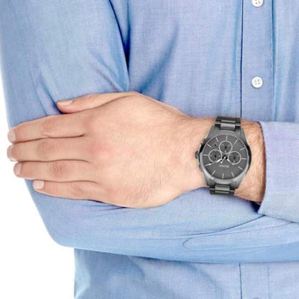 Hugo Boss Onyx chronograph watch worn on wrist with blue shirt
