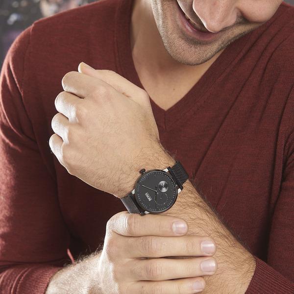 Hugo Boss Oxygen all-black watch worn on wrist with burgundy shirt