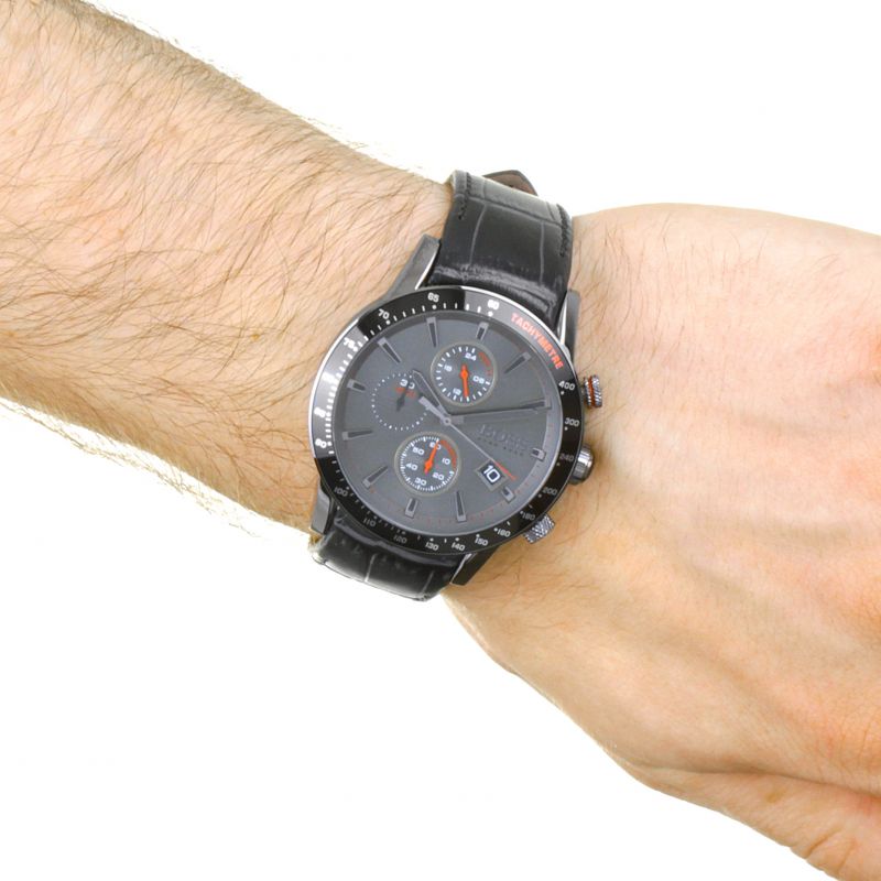 Hugo Boss Rafale watch on male wrist showing grey dial and red chronograph hands