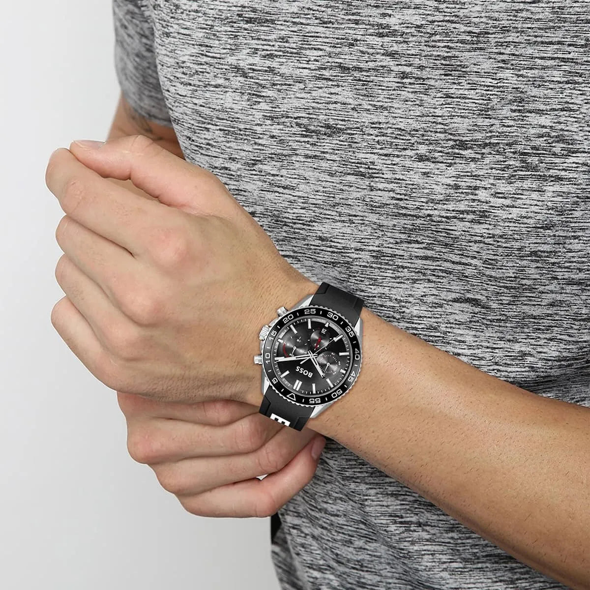 Hugo Boss Runner chronograph watch on wrist showing black dial and silver-tone case
