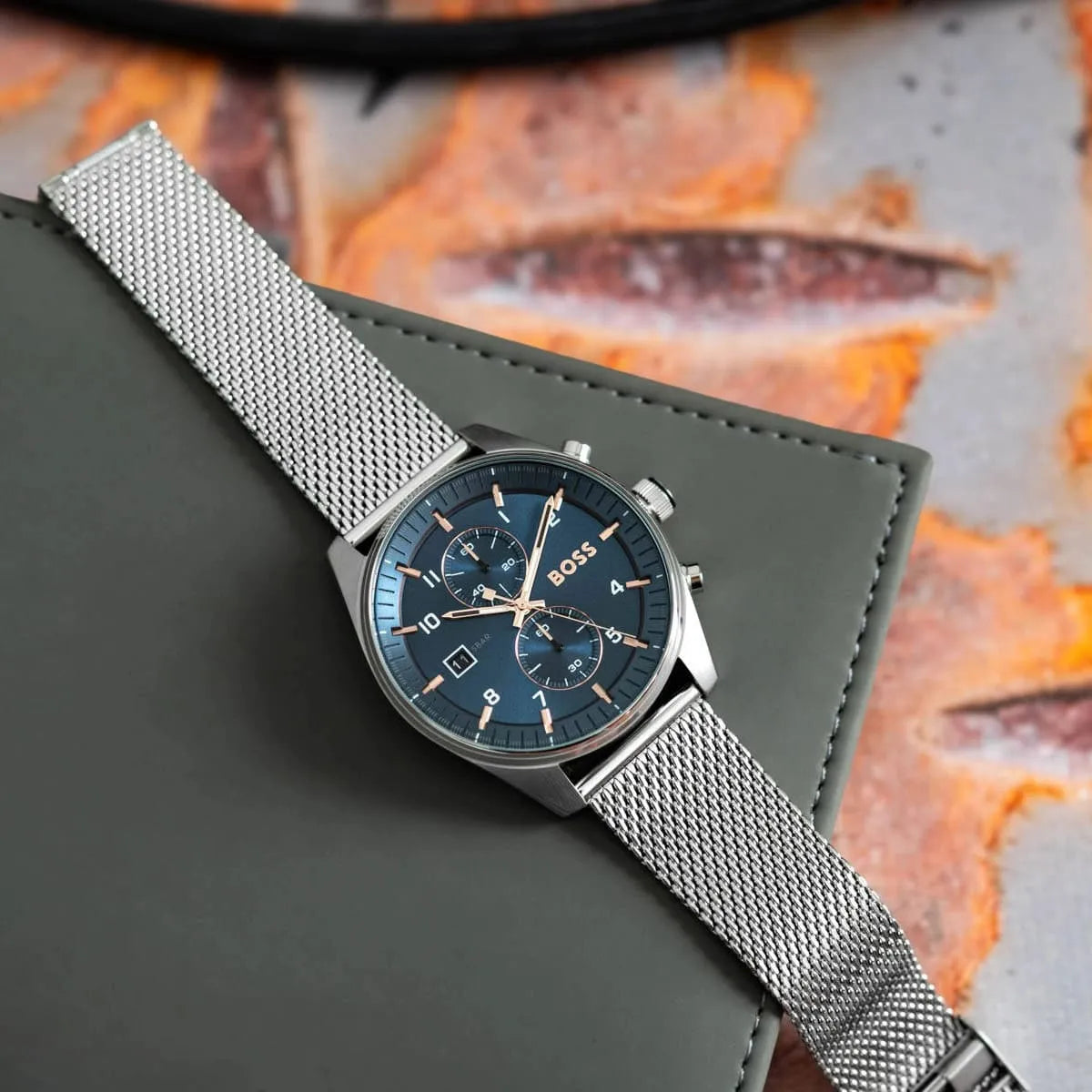 Hugo Boss Strike watch worn on wrist with mesh band