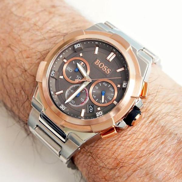 Hugo Boss Supernova chronograph watch on wrist showing grey dial and two-tone case