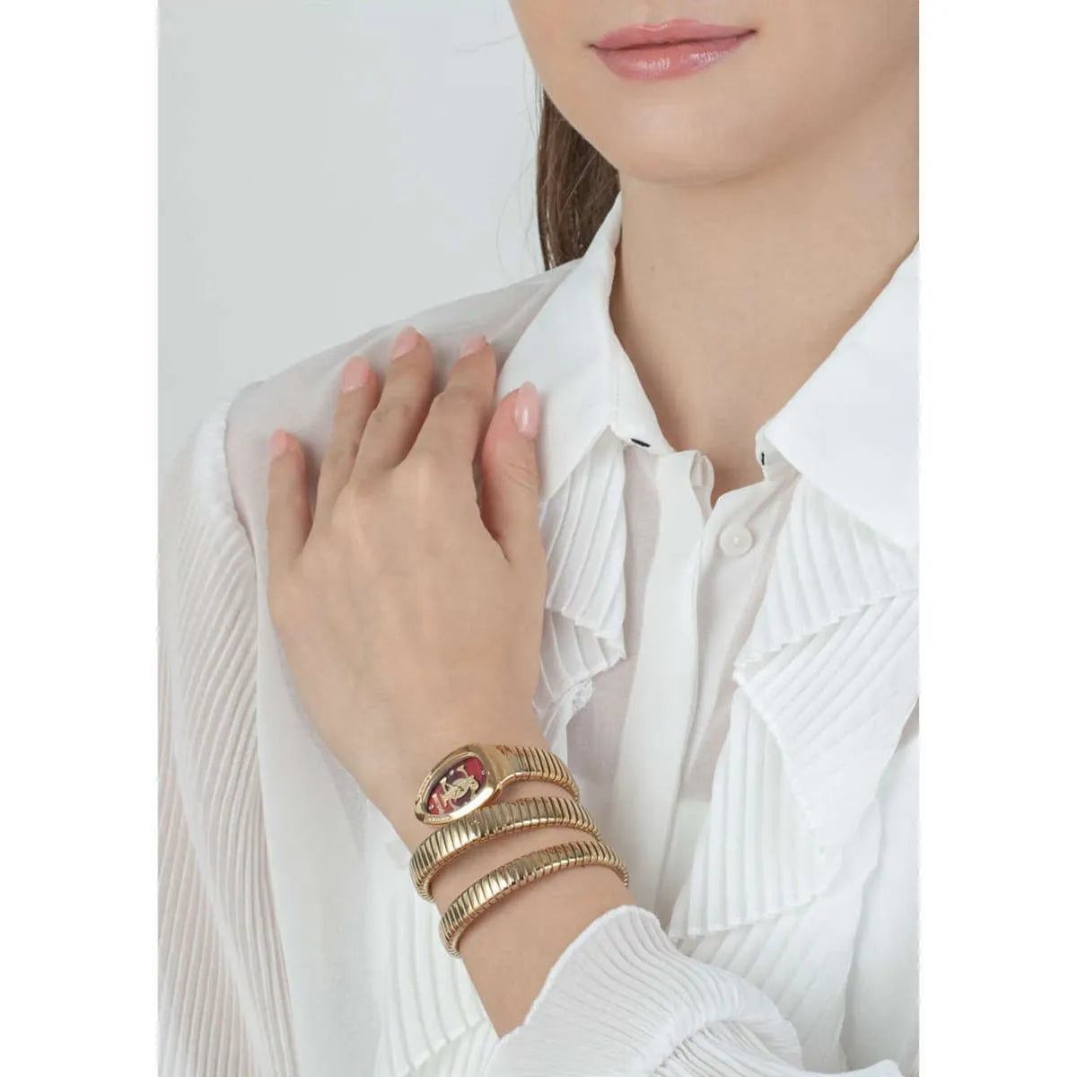 Just Cavalli Glam Evo 5 watch worn on wrist with triple-wrap gold strap design
