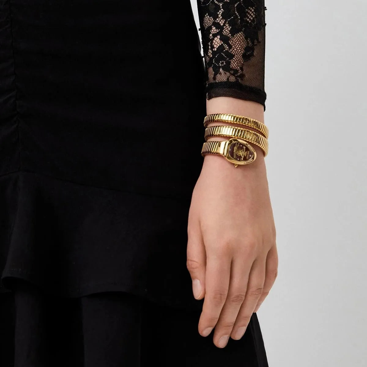 Just Cavalli Glam Evo 5 women's watch worn on wrist showing snake strap and red dial