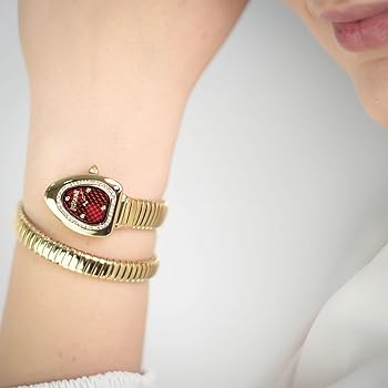Just Cavalli wrap-around snake watch worn on wrist with red dial and crystal bezel