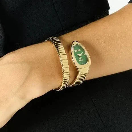 Just Cavalli Glam Evo 4 women's watch with green dial worn on wrist with gold bangle