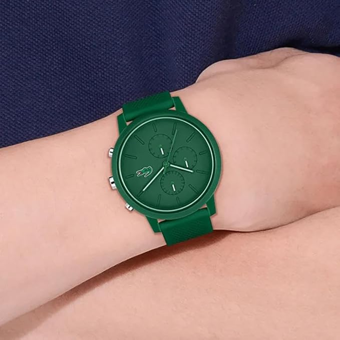 Lacoste 12.12 green chronograph watch worn on wrist