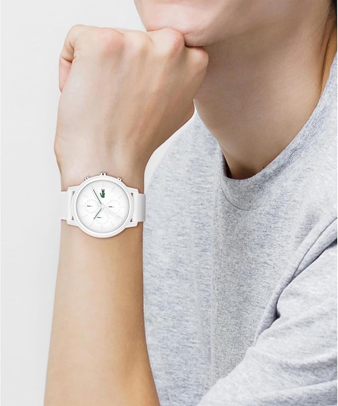 Lacoste 12.12 white chronograph watch worn on wrist