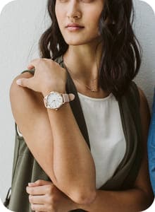 Lacoste gold quartz women's watch worn on wrist with crocodile dial visible
