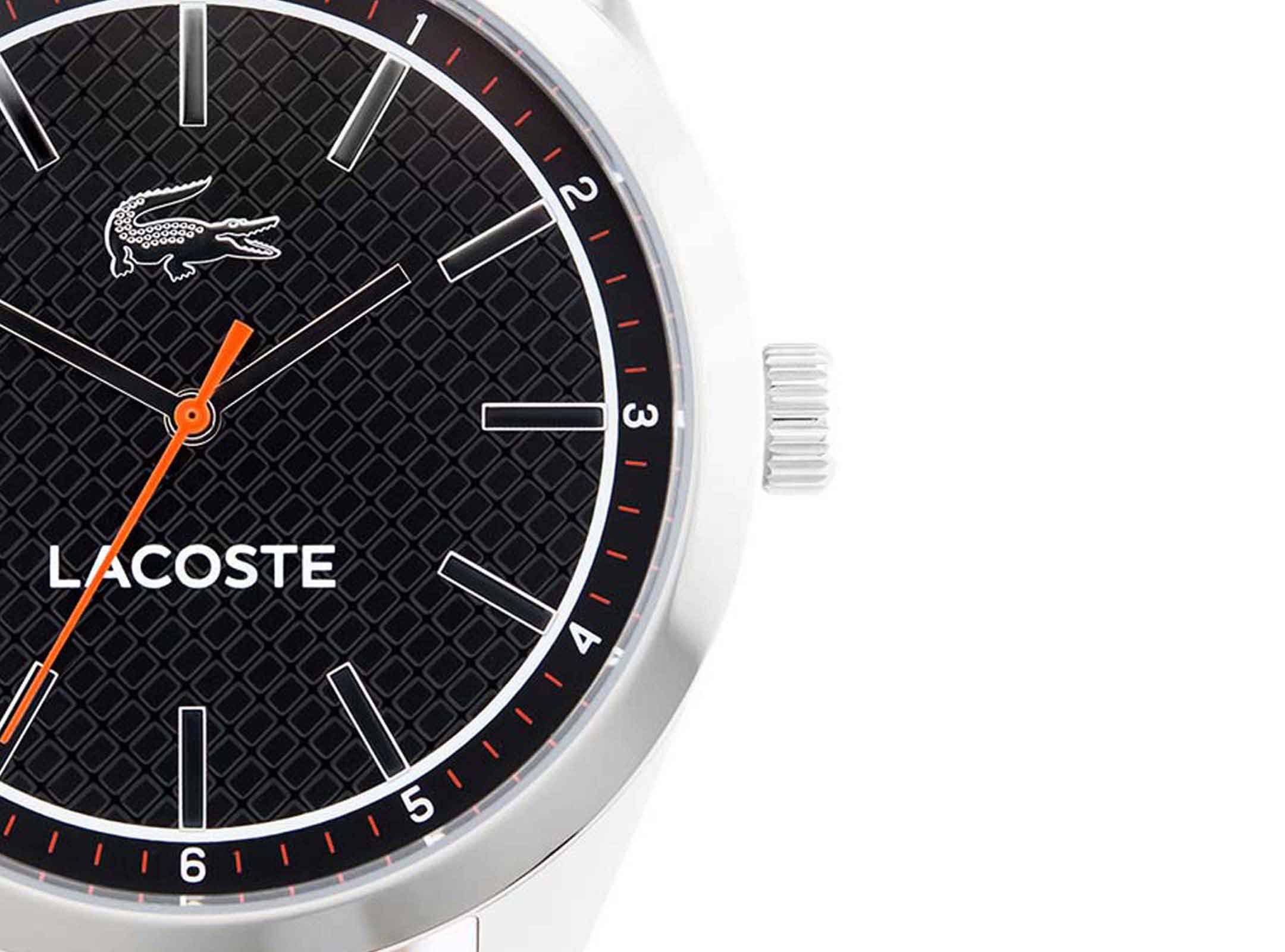 Lacoste 2010888 dial detail with black textured face, white bar indices, and orange seconds hand