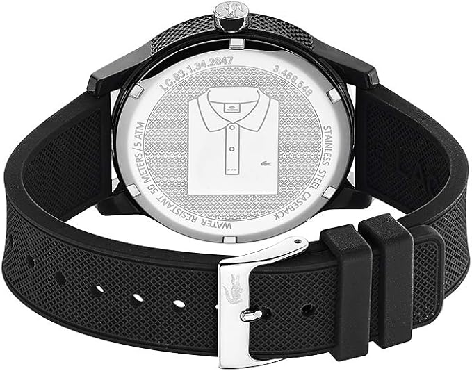 Lacoste watch caseback showing Lacoste branding and model information with black silicone strap