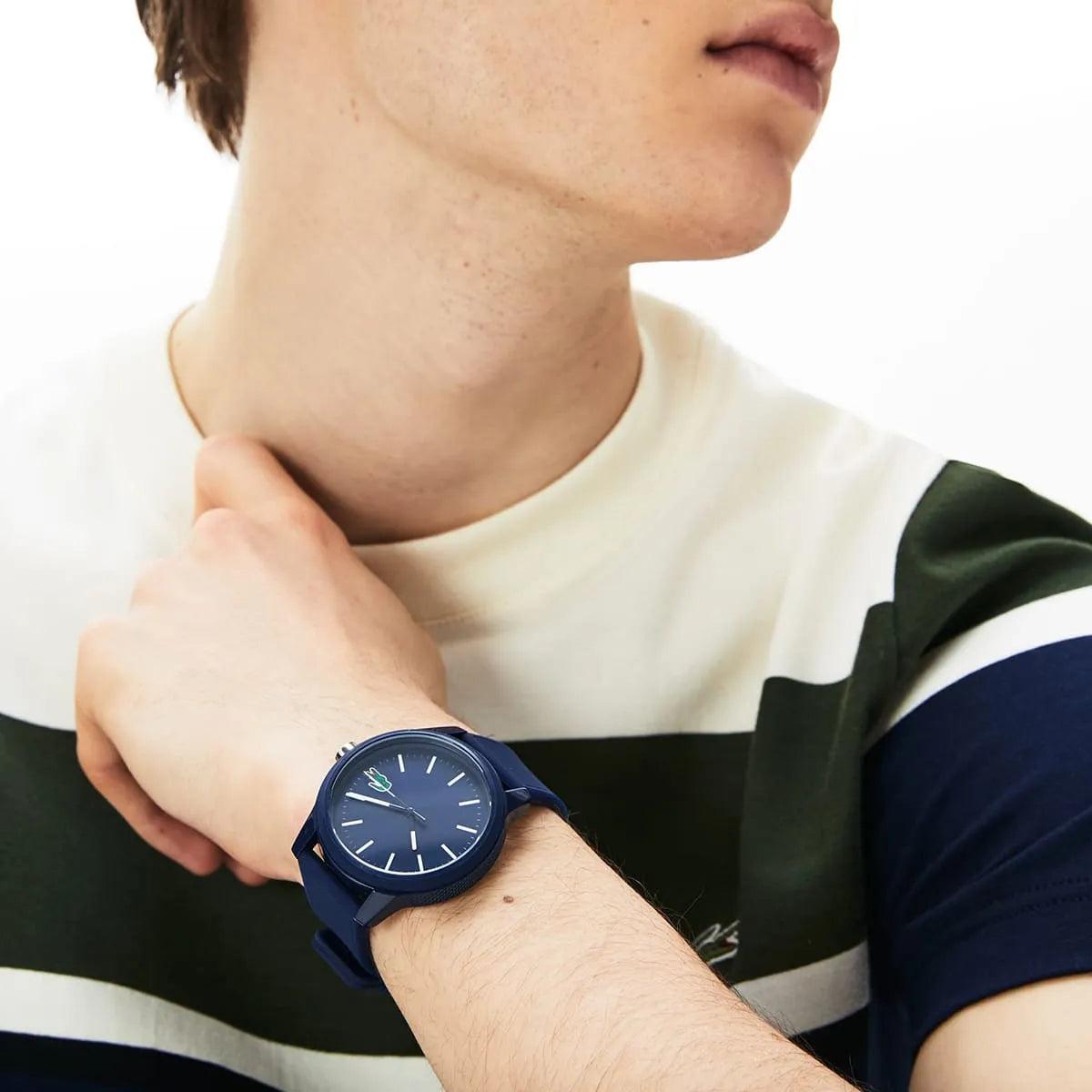 Lacoste 2010987 blue quartz watch worn on wrist, showing dial and silicone strap