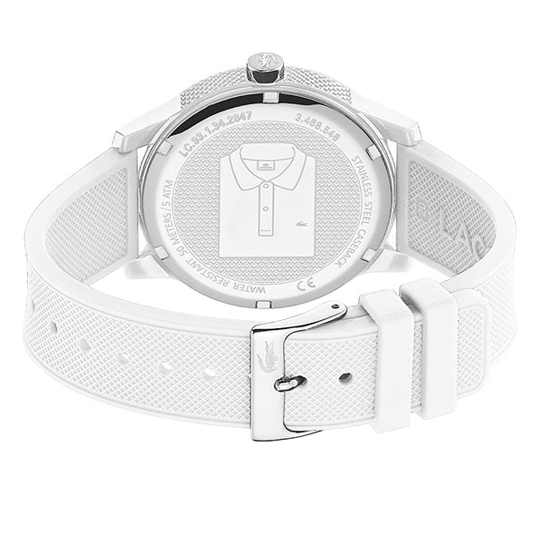 Lacoste white watch shown worn on wrist with white silicone strap and caseback visible