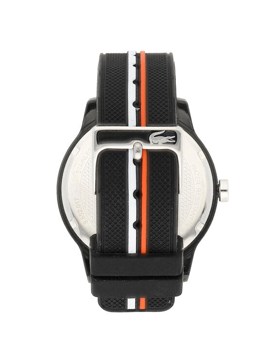 Side view of Lacoste 2011071 watch showing case profile, crown, and black silicone strap with stripe detail