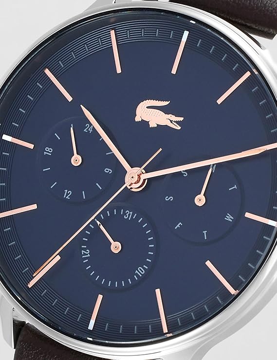 Lacoste Club dial close-up showing chronograph subdials, rose gold hands, and hour markers