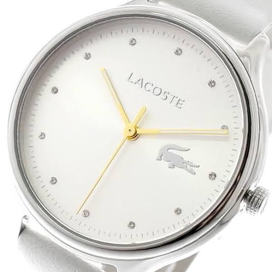 Lacoste CONSTANCE dial close-up with gold-tone hands and crystal hour markers