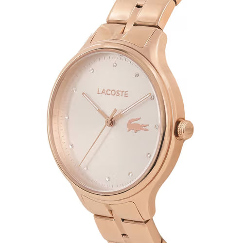 Lacoste Constance rose gold watch with white dial and crystal index markers, angled side view