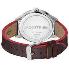 Lacoste Continental watch caseback showing silver case with brown and red leather strap