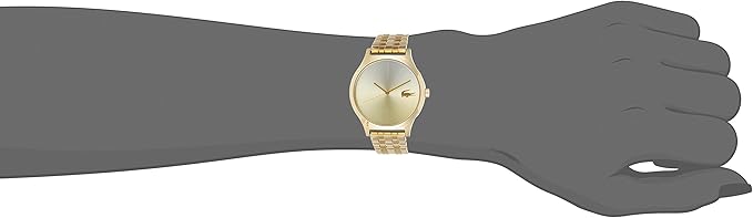 Lacoste Nikita gold tone steel watch on woman's wrist showing size and fit