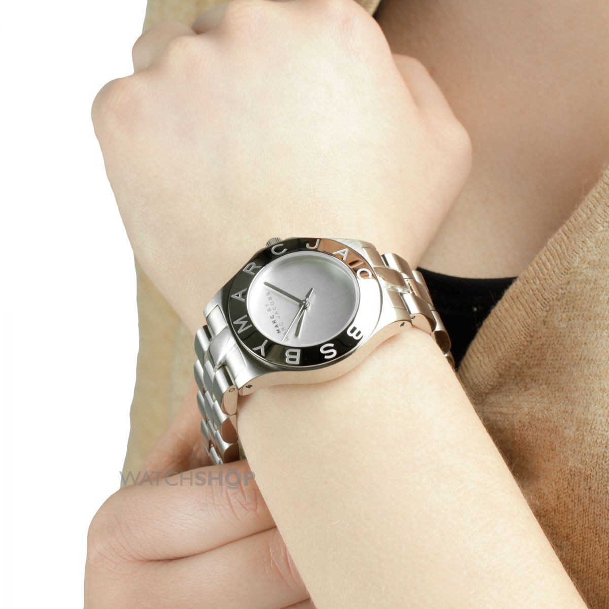 Marc by Marc Jacobs Blade women's watch on wrist showing white dial and silver bracelet