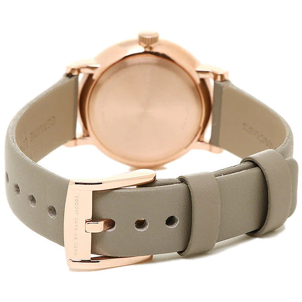 Rear view showing rose gold case back and grey leather strap with buckle