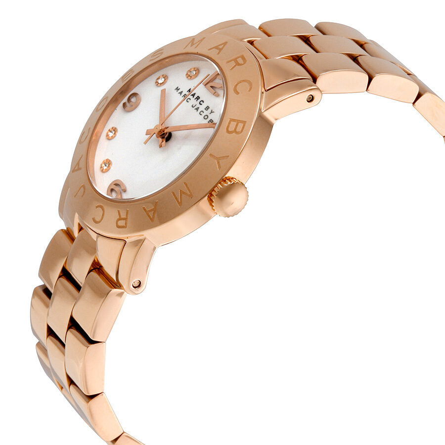 Side angle view of Marc by Marc Jacobs MBM3077 watch showing bezel and rose gold bracelet
