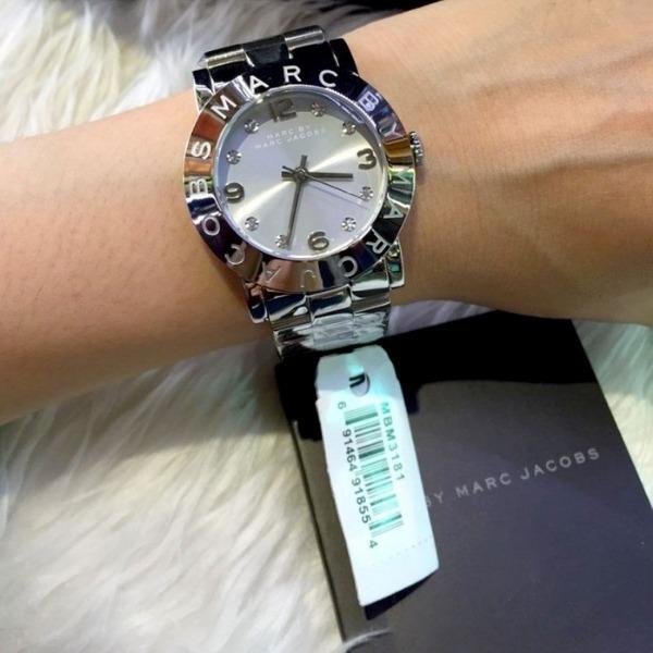 Marc by Marc Jacobs MBM3181 watch worn on wrist showing white dial, stainless steel link band