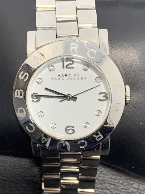 Marc Jacobs Amy watch face with white dial and crystal hour markers with bold numerals