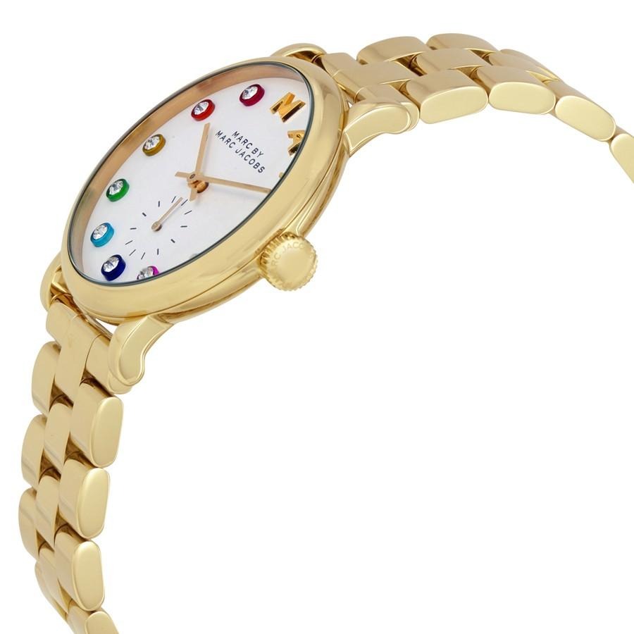 Side angle of Marc Jacobs Baker gold-tone watch showing white dial and metal bracelet strap
